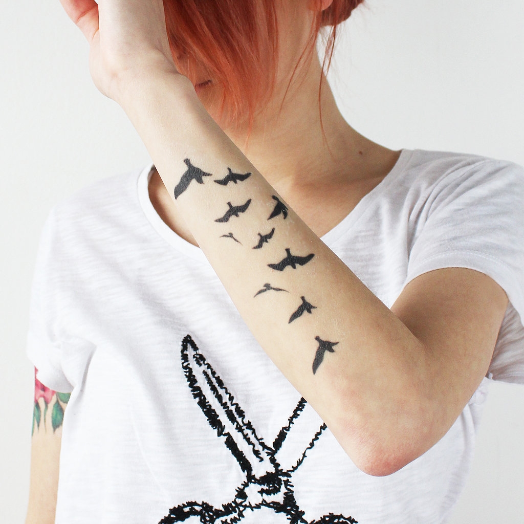 tattoos of birds in flight