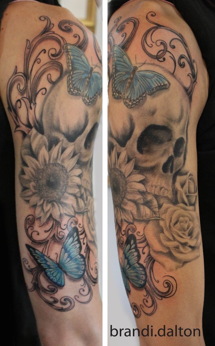 skull with butterfly tattoo
